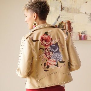 Blank NYC size medium studded and embroidered faux leather jacket